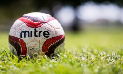 Football on a soccer pitch.