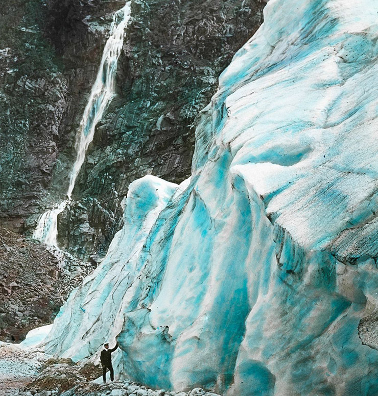 Old Norway: Man in front of glacier and waterfall in rural Norway