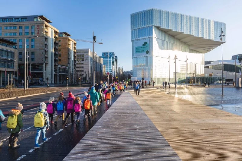 Children participate in a pre-opening event at the new Oslo library