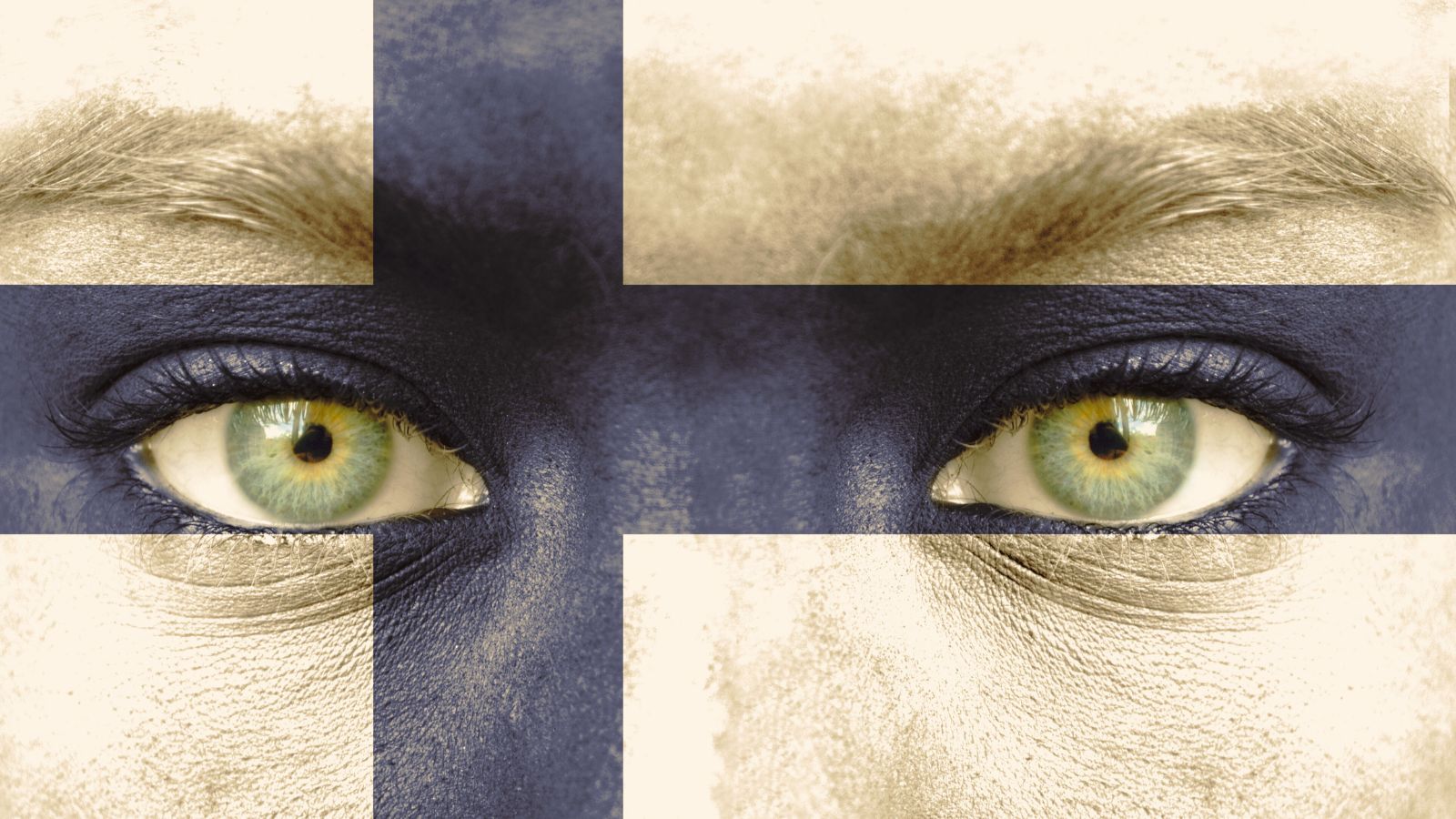 Flag of Finland on the face of a Finn.