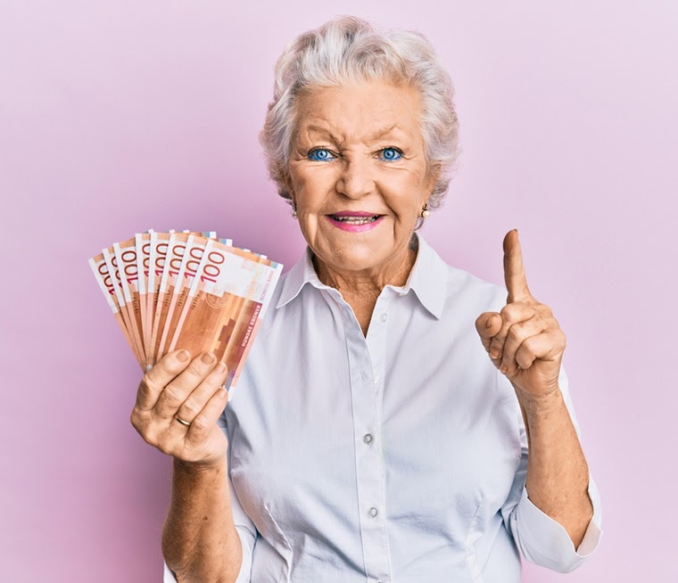 elderly norwegian holding money