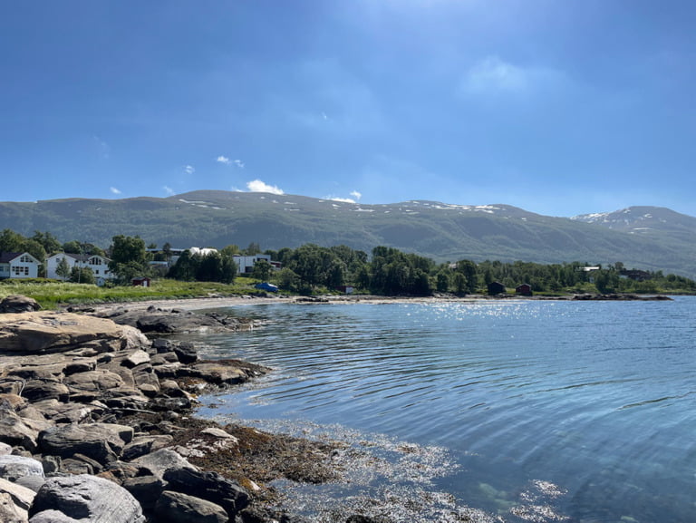 The calm water at Telegrafbukta bay in Tromsø, Northern Norway