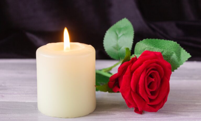 Rose and candle memorial