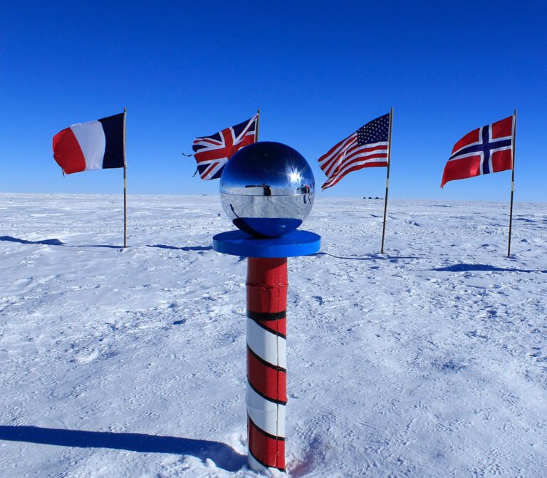 South Pole marker and flags.