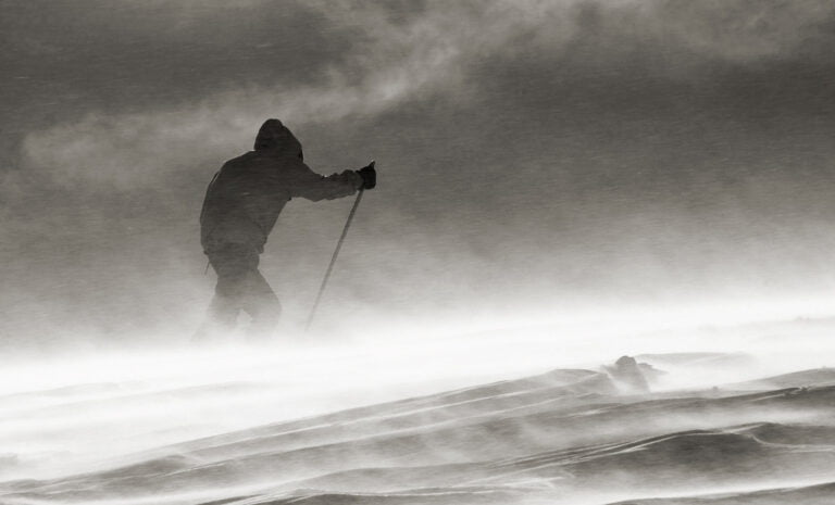 Norway skier in bad weather.