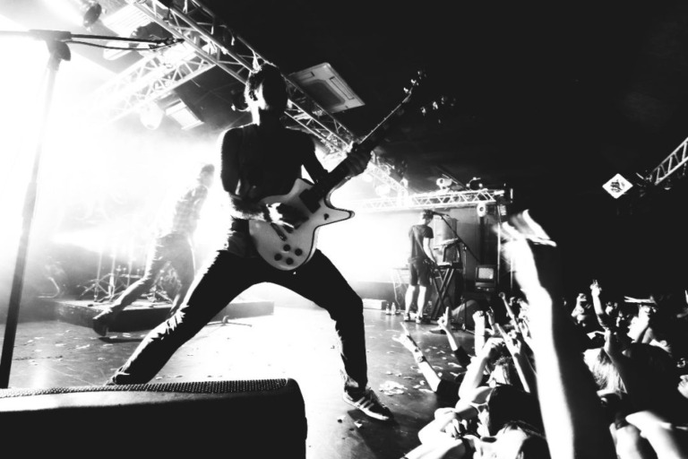 Black metal guitarist performing live in Norway.