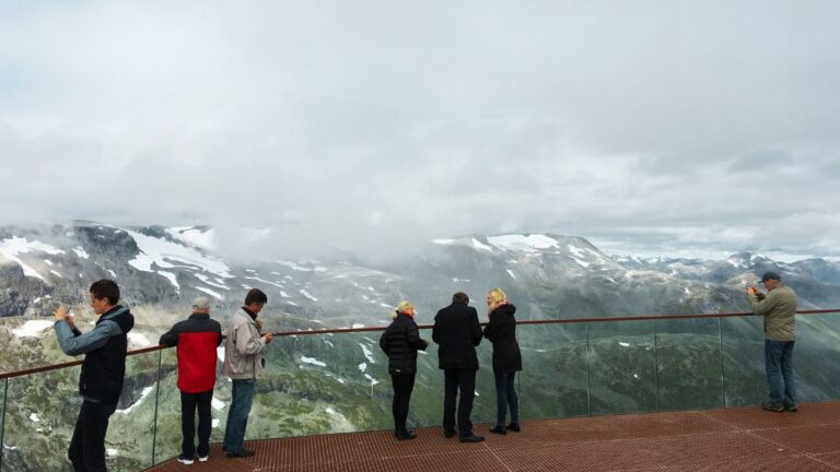People at Geiranger Skywalk on a slightly cloudy day. Photo: David Nikel.