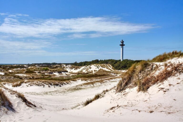 Dueodde Lighthouse seen from the sand dunes.