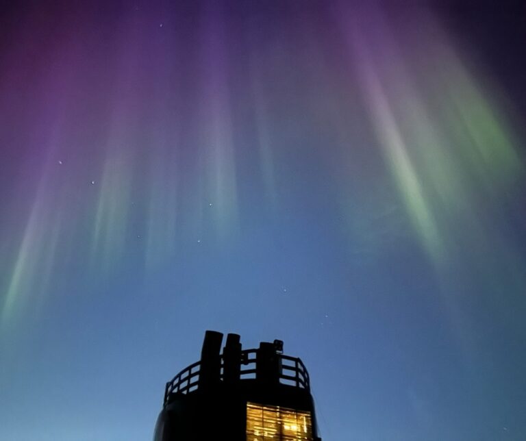 Aurora 'shards' above Hurtigruten Trollfjord. Photo: David Nikel.