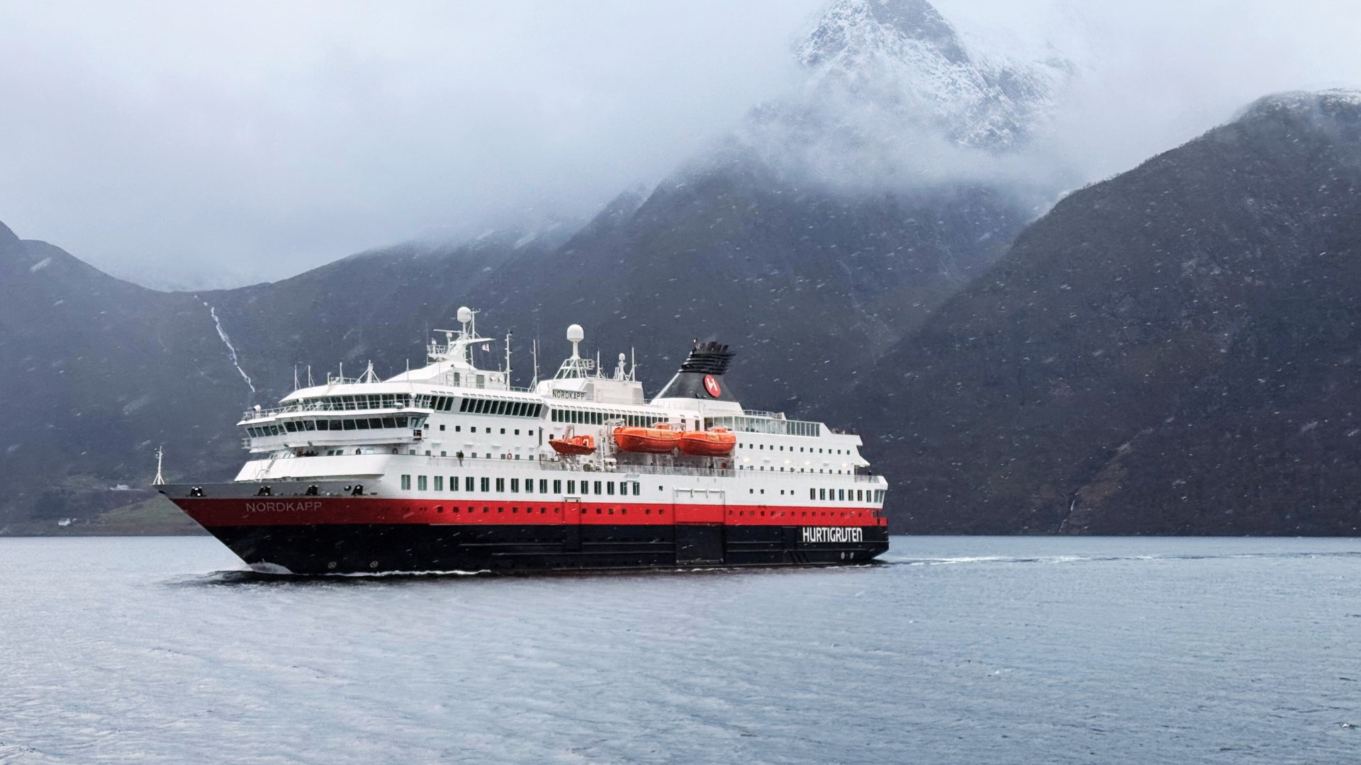 Hurtigruten vessel in the Hjørundfjord of Norway. Photo: David Nikel.