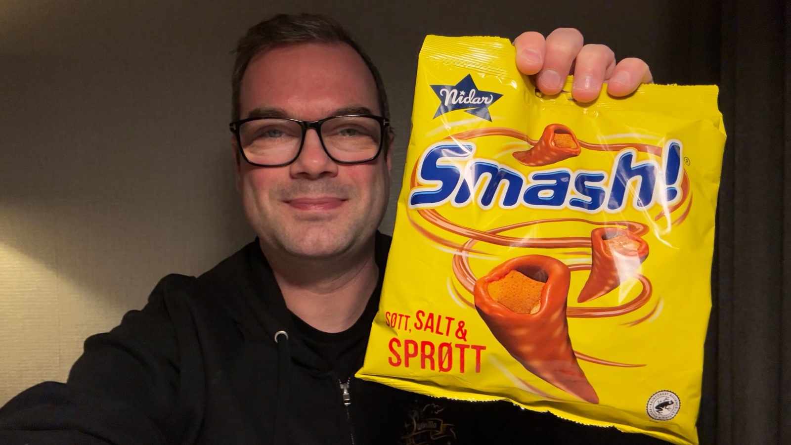 David holding bag of Smash. Photo: David Nikel.